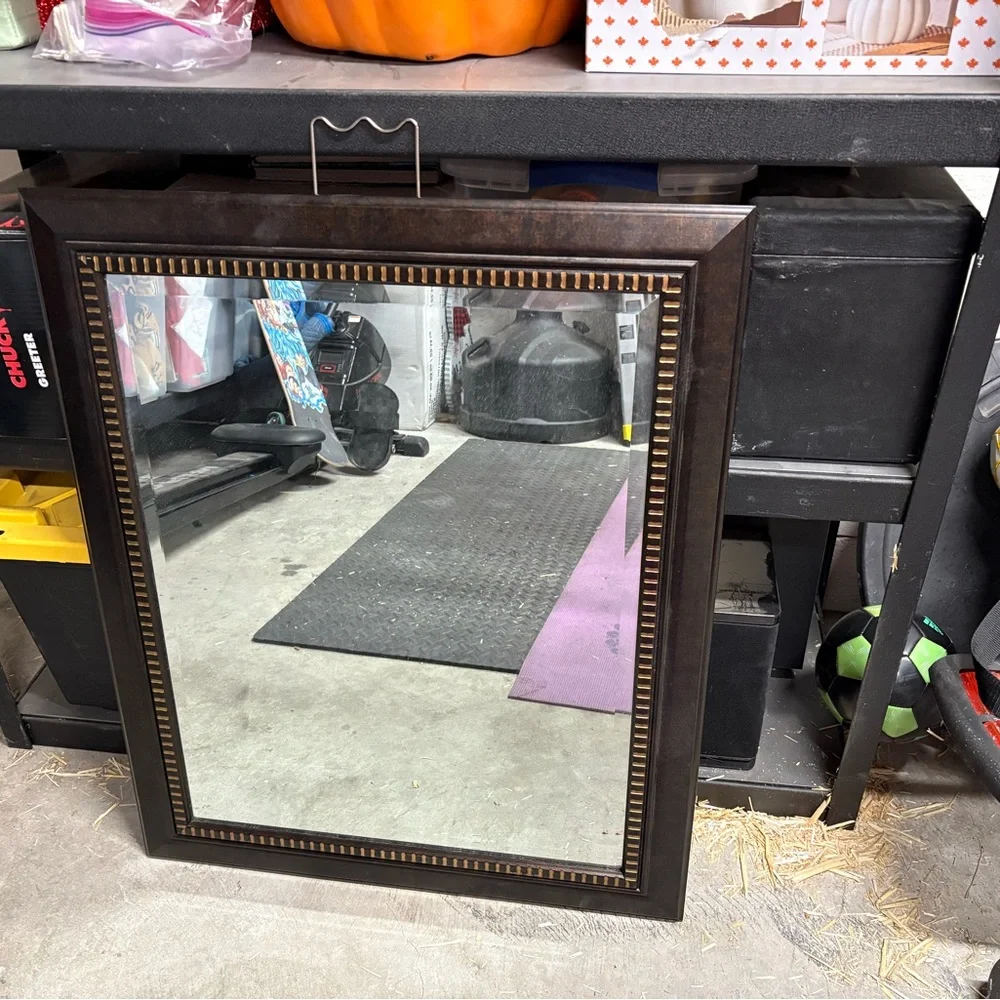 Ornate Brown Wall Mirror with Textured Frame